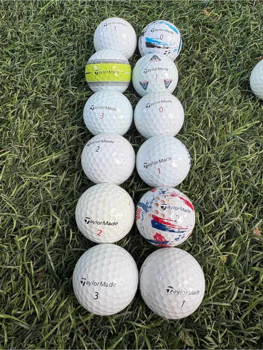 TaylorMade White Golf Balls with Blue, Red, Yellow, and Green Accents